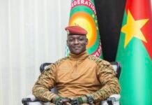 Military rulers abolish political parties, citing national unity